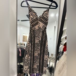 Black and beige lace dress